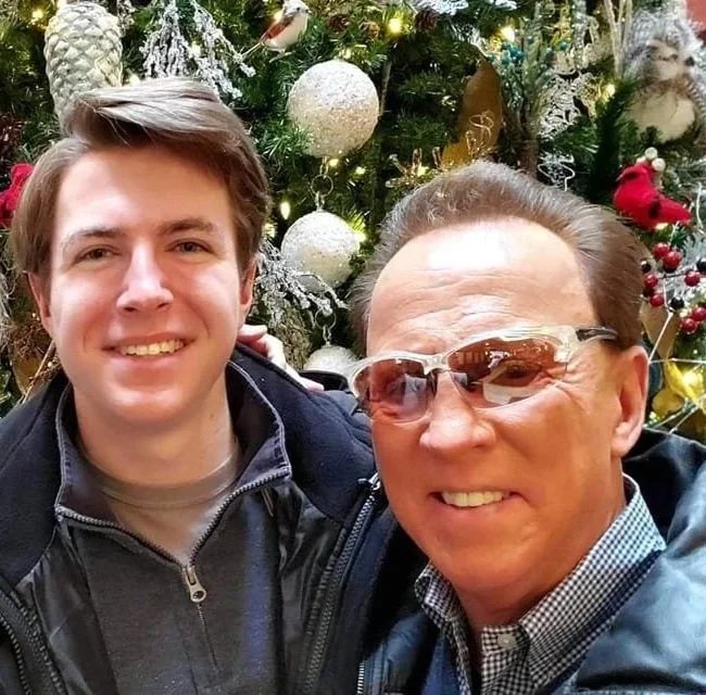 Reed smiling for a selfie at Christmas